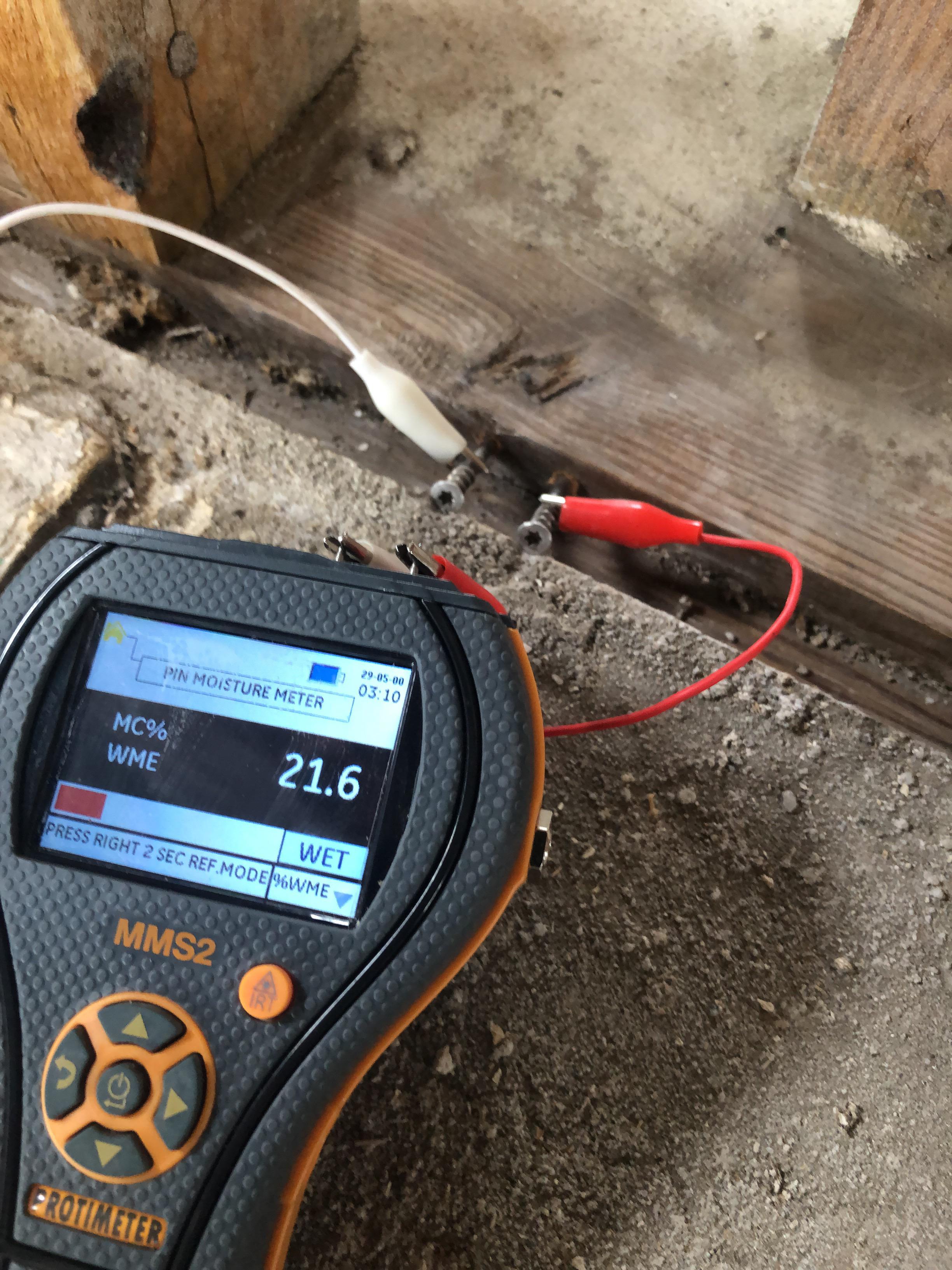 Moisture meter showing wet materials