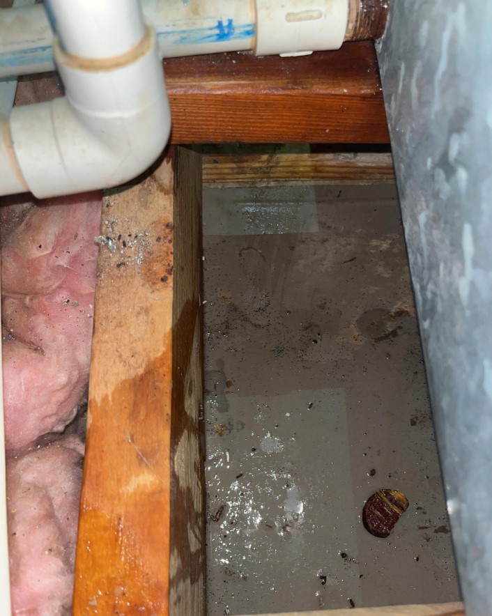 Wet attic water heater broken line