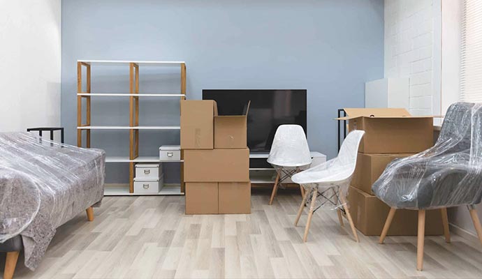 Wooden rack,box sofa,smart TV, and content packout in the room